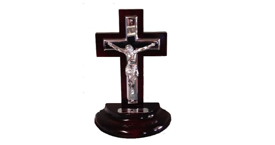 A wooden crucifix mounted on a stand