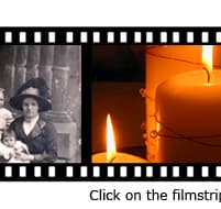 A filmstrip of photographs beside a lit candle