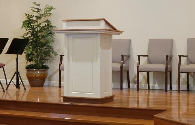 A lectern and seating in a chapel