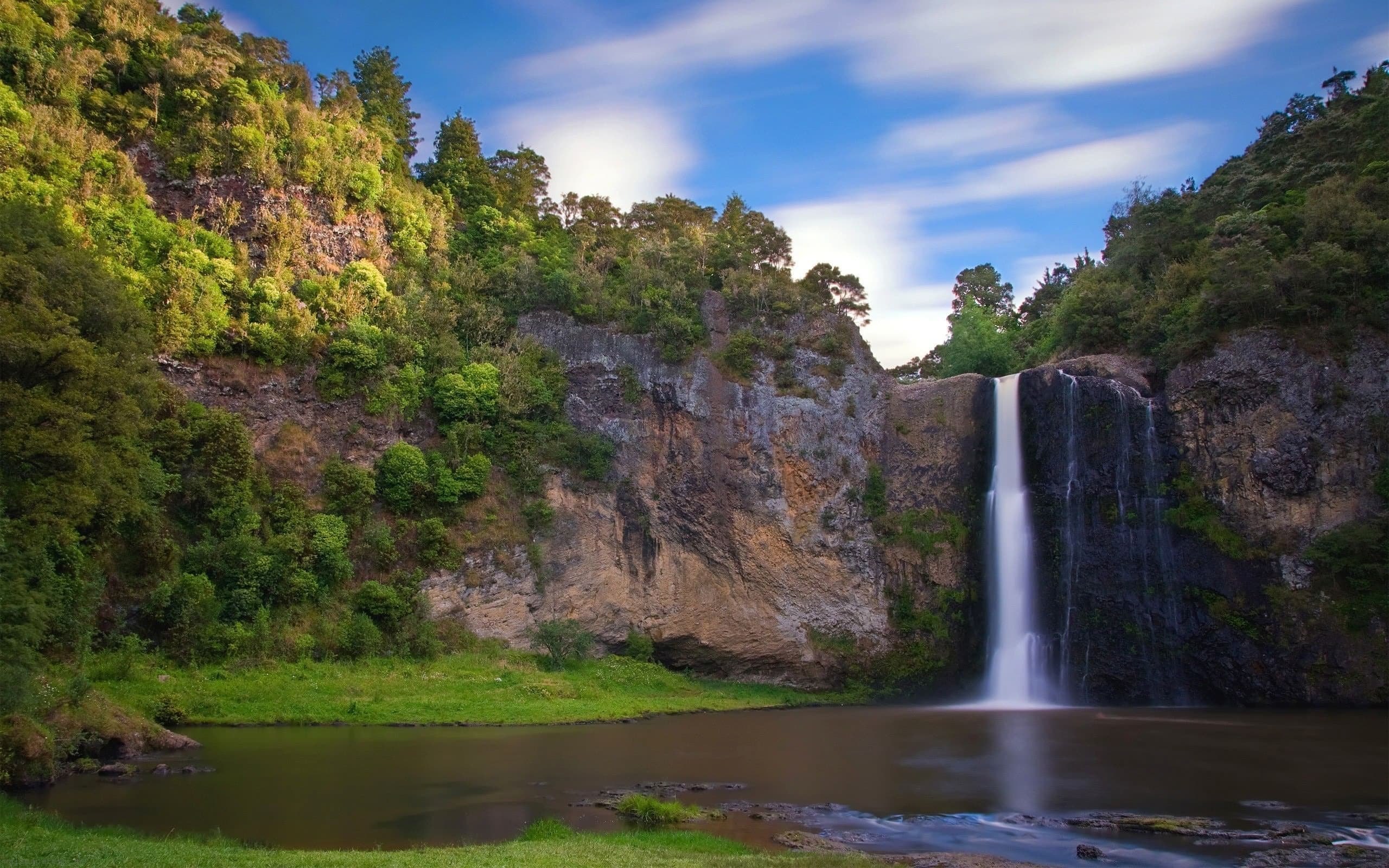 A waterfall in a forest setting